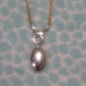 Vintage Monet gold plated chain with silver tone pendant